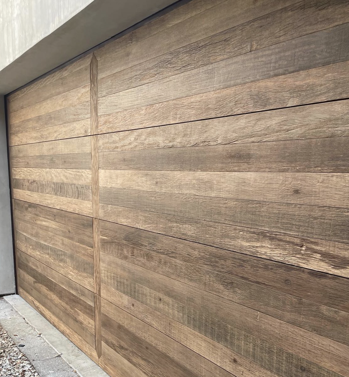 reclaimed ITAUBA side door and matching the garage door
